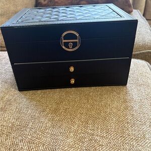 Large jewelry box filled with jewelry